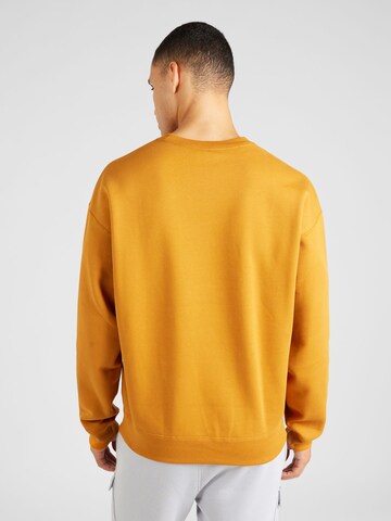 Nike Sportswear Sweatshirt 'Swoosh' in Geel