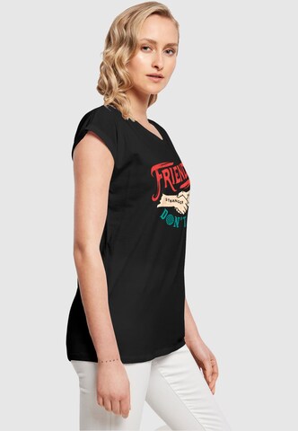 ABSOLUTE CULT T-Shirt 'Stranger Things - Friends Dont Lie Hands' in Schwarz