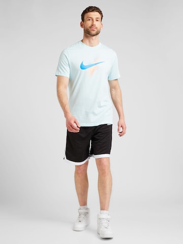 T-Shirt 'SWOOSH' Nike Sportswear en bleu