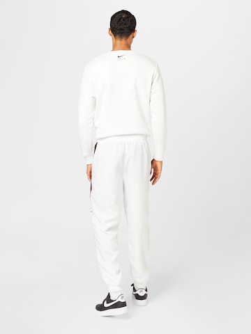 Effilé Pantalon 'Air' Nike Sportswear en blanc
