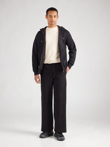 Loosefit Pantaloni di TOPMAN in nero