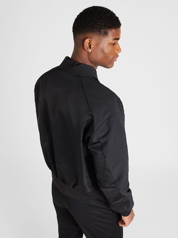 Calvin Klein Prechodná bunda 'HERO' - Čierna