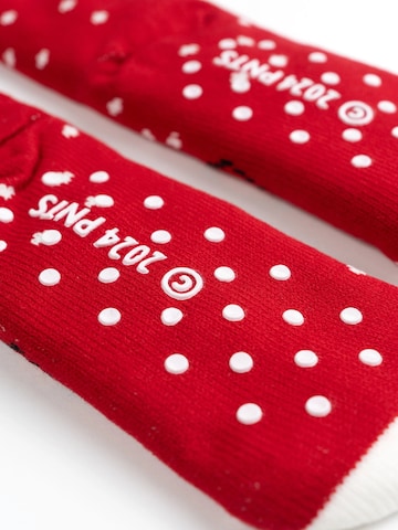 Snoopy & Die Peanuts Socken‌‌‌ in Rot