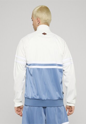 Giacca per l'allenamento 'DMWU' di Unfair Athletics in blu