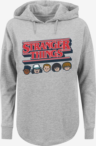 Sweat-shirt 'Stranger Things Caricature Logo Netflix TV Series' F4NT4STIC en gris : devant