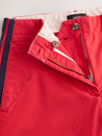 regular Pantaloni chino di Next in rosso