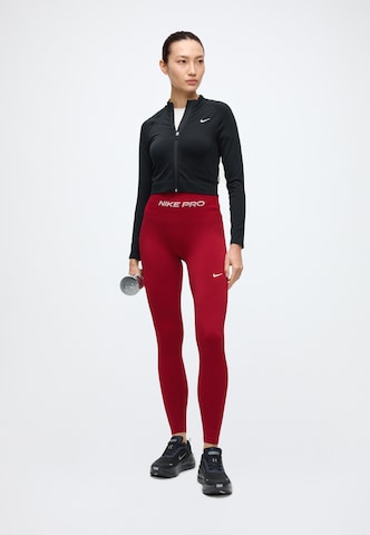 NIKE Kitsas Spordipüksid 'Pro', värv punane