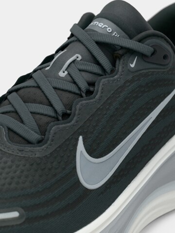 NIKE Running shoe 'Vomero Plus' in Grey