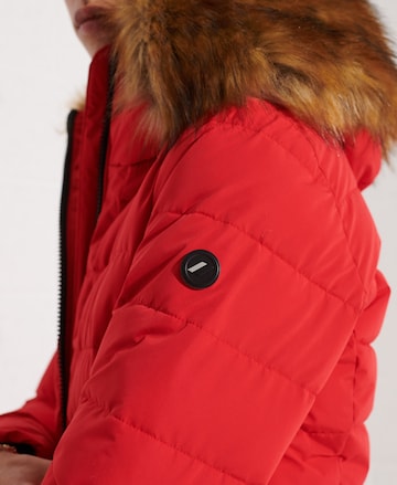 Manteau d’hiver 'Arctic' Superdry en rouge