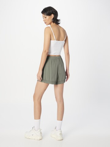 ABOUT YOU Loose fit Pants 'Dorina' in Green