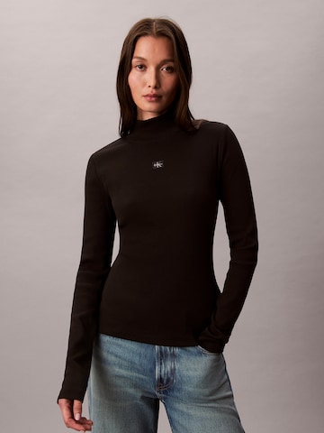 T-shirt Calvin Klein Jeans en noir : devant