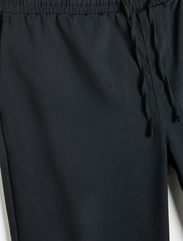 Koton Regular Hose in Schwarz