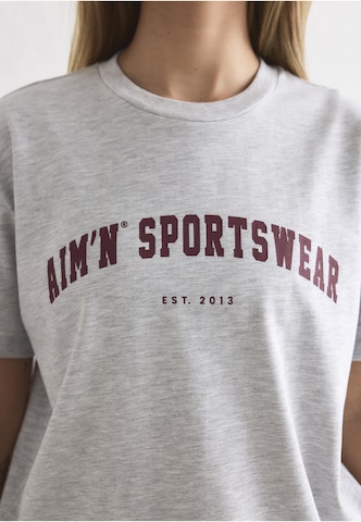 Aim'n Funkční tričko 'Varsity' – šedá