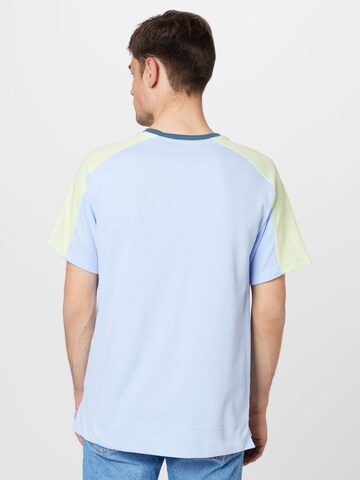 T-Shirt fonctionnel NIKE en bleu