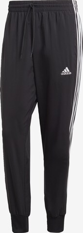 ADIDAS SPORTSWEAR Tapered Sportbroek 'Essentials' in Zwart: voorkant