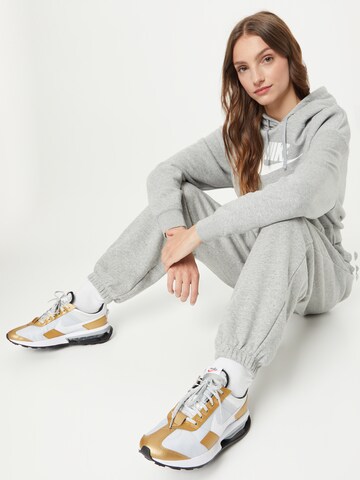 Nike Sportswear Широка кройка Панталон в сиво