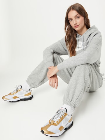 Loosefit Pantalon Nike Sportswear en gris