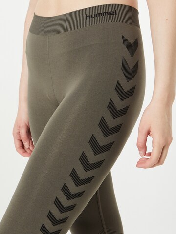 Skinny Pantaloni sport 'First' de la Hummel pe verde