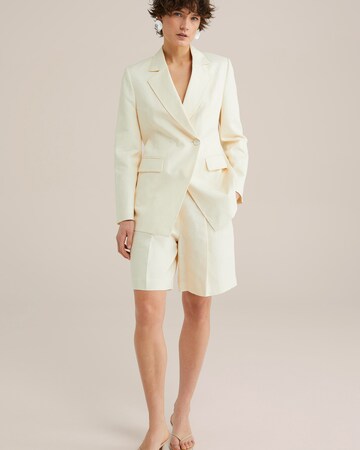 WE Fashion Loose fit Trousers with creases in Beige