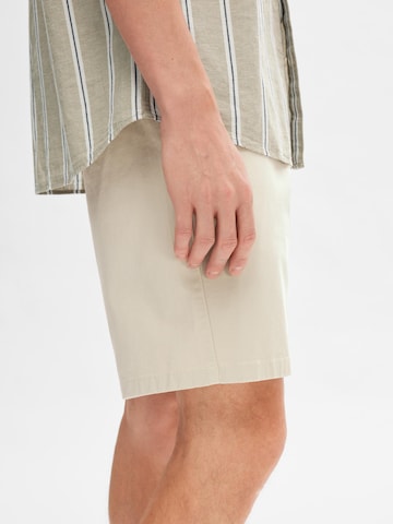 SELECTED HOMME - Regular Calças chino 'BILL' em bege