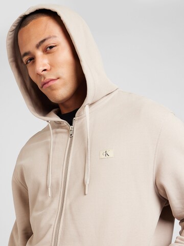 Calvin Klein Jeans Zip-Up Hoodie in Beige