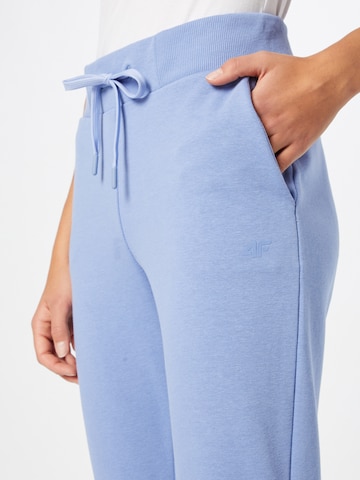 Tapered Pantaloni sportivi di 4F in blu