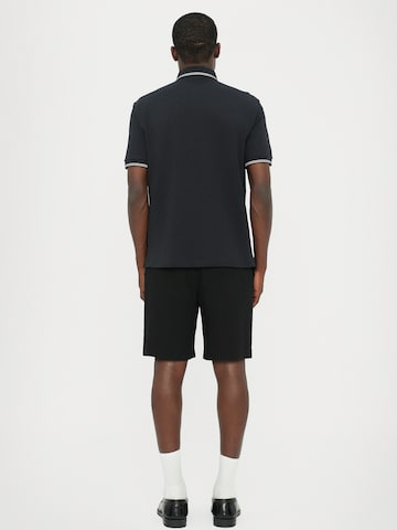 ARMANI EXCHANGE Poloshirt in Schwarz