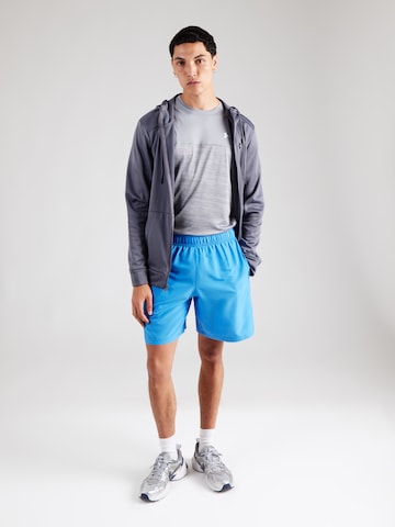UNDER ARMOUR Обычный Спортивные штаны 'Wordmark' в Синий