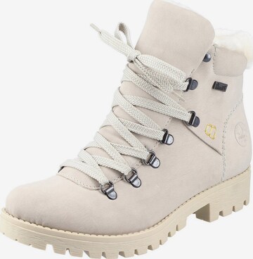 Bottines à lacets Rieker en beige : devant