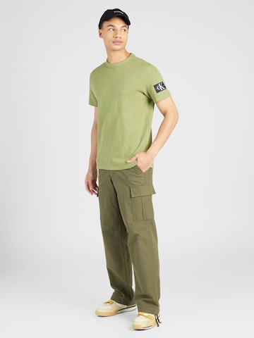 Calvin Klein Jeans قميص بلون أخضر