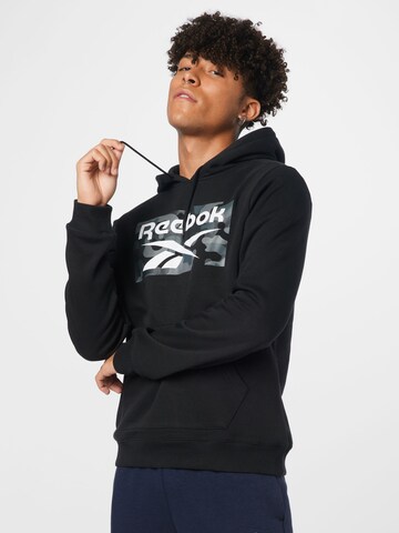 Sweat de sport Reebok en noir : devant