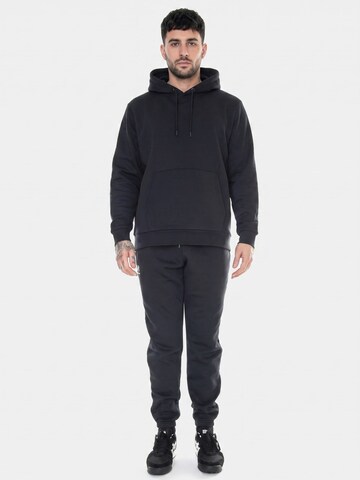 Baggy Pantalon 'UA Essential Fleece Joggers Black' UNDER ARMOUR en noir
