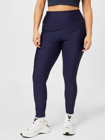 Skinny Pantalon de sport UNDER ARMOUR en bleu : devant