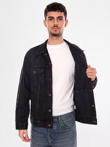 LEVI'S ® Between-season jacket 'RELAXED TYPE III TRUCKER JACKET BLACK' in Black