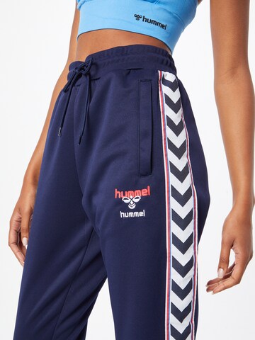 Effilé Pantalon de sport Hummel en bleu