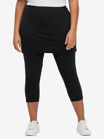 SHEEGO Skinny Leggings in Black: front