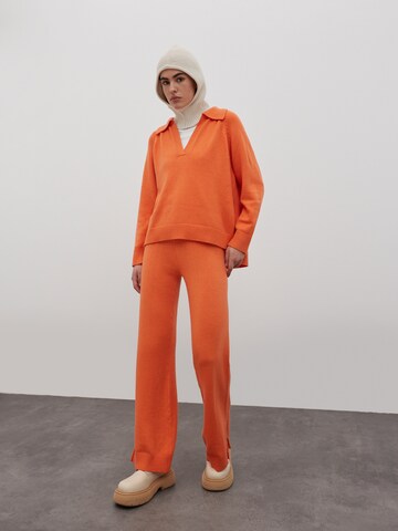 EDITED Bootcut Spodnie 'Lunette' w kolorze pomarańczowy