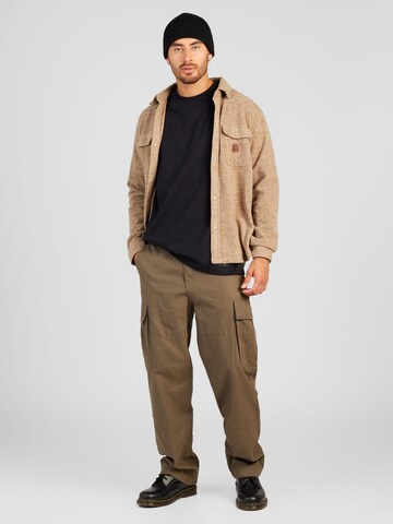WEEKDAY Loosefit Gargohousut 'Joel' värissä vihreä