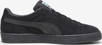 Baskets basses PUMA en noir