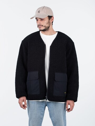 Carhartt WIP Übergangsjacke 'Devin Liner' in Schwarz