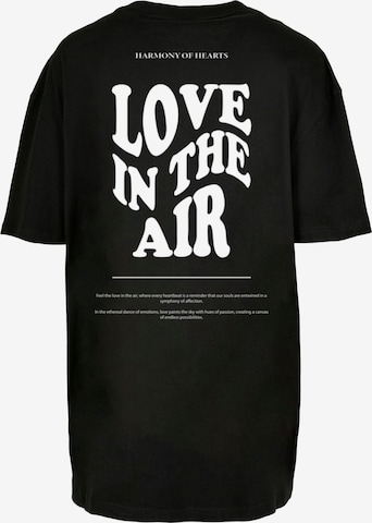Merchcode T-Shirt 'Love In The Air' in Schwarz