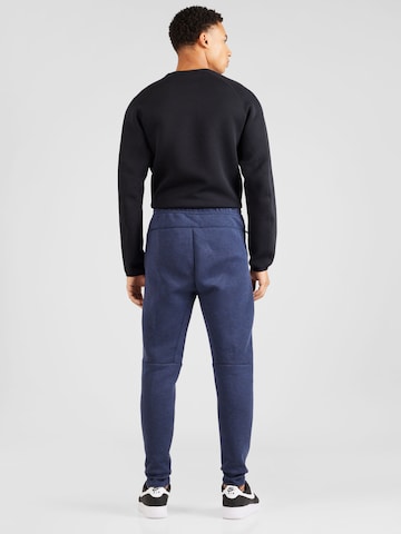 Nike Sportswear Tapered Trousers 'TECH FLEECE' in Blue