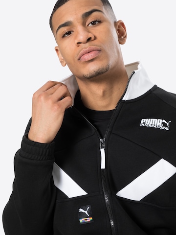 PUMA - Chaqueta de chándal en negro