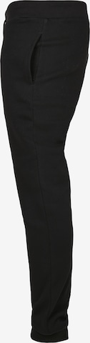 Tapered Pantaloni di Urban Classics in nero