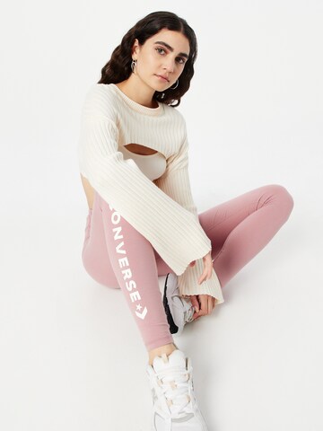 CONVERSE Skinny Spodnie 'Wordmark' w kolorze różowy