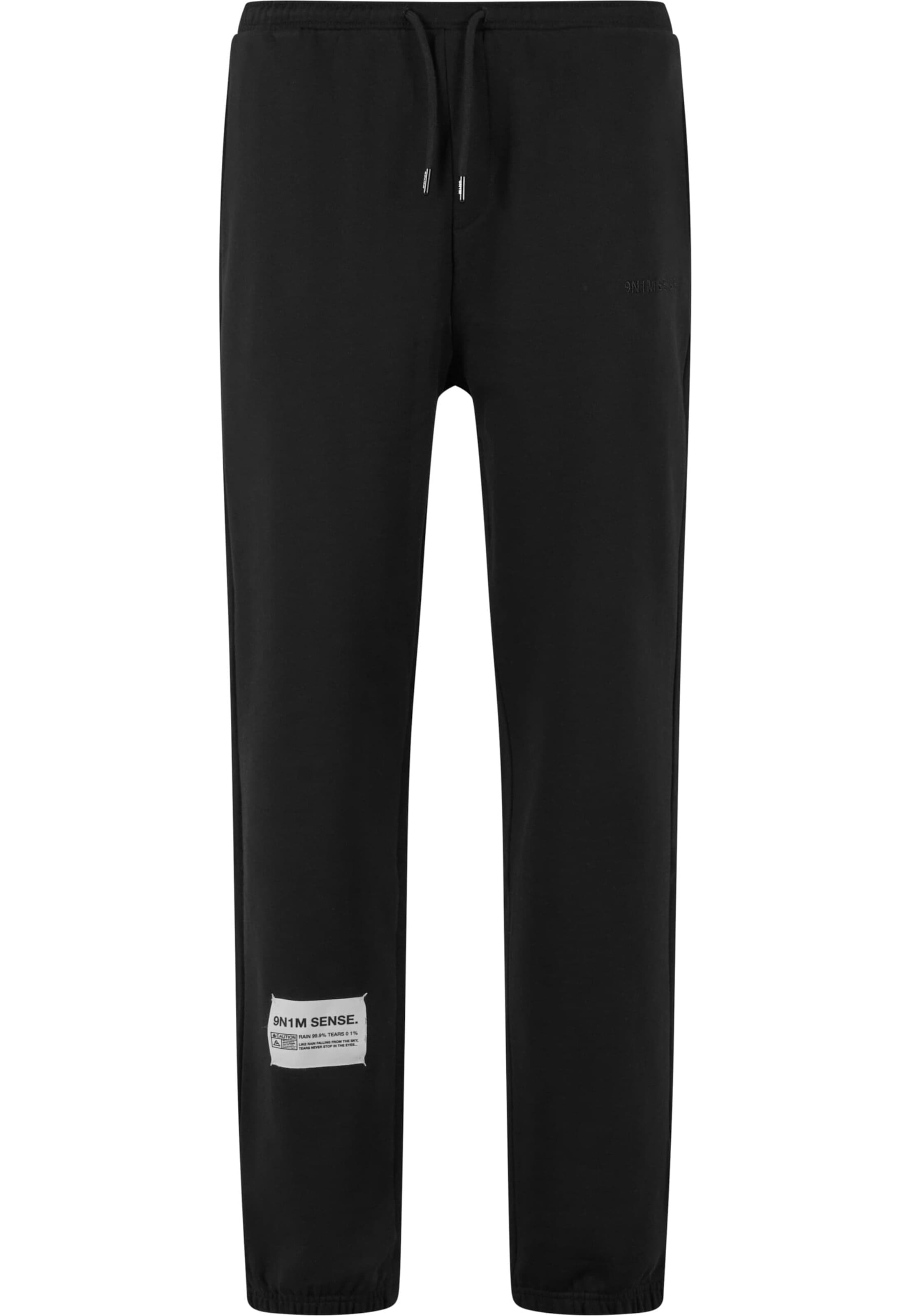 9N1M SENSE Loose fit Trousers in Black: front