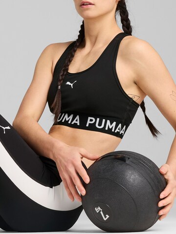 Bustino Reggiseno sportivo '4Keeps' di PUMA in nero