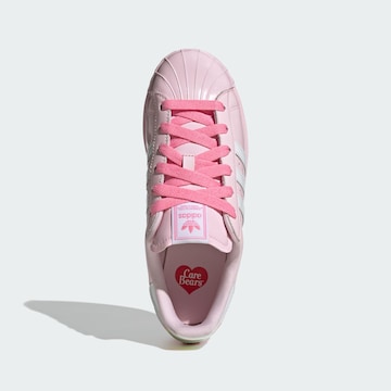 ADIDAS ORIGINALSNiske tenisice 'Care Bears X Adidas Superstar II' - roza boja