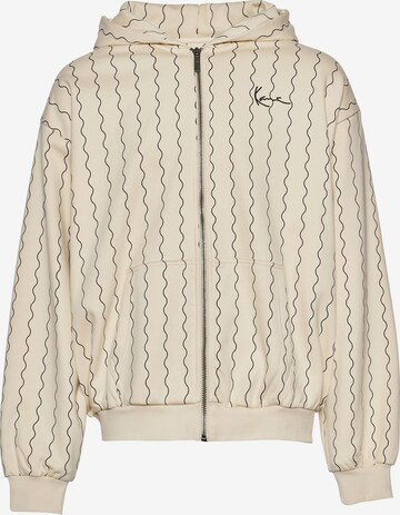 Veste de survêtement Karl Kani en beige : devant