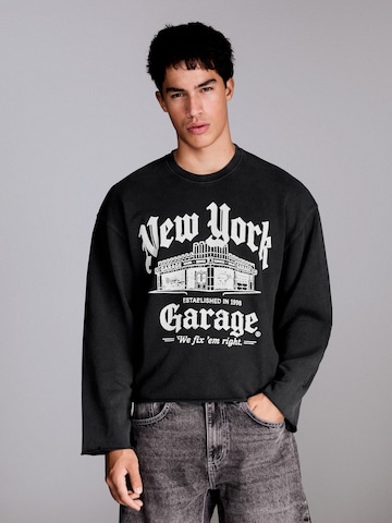 Sweat-shirt Bershka en noir : devant